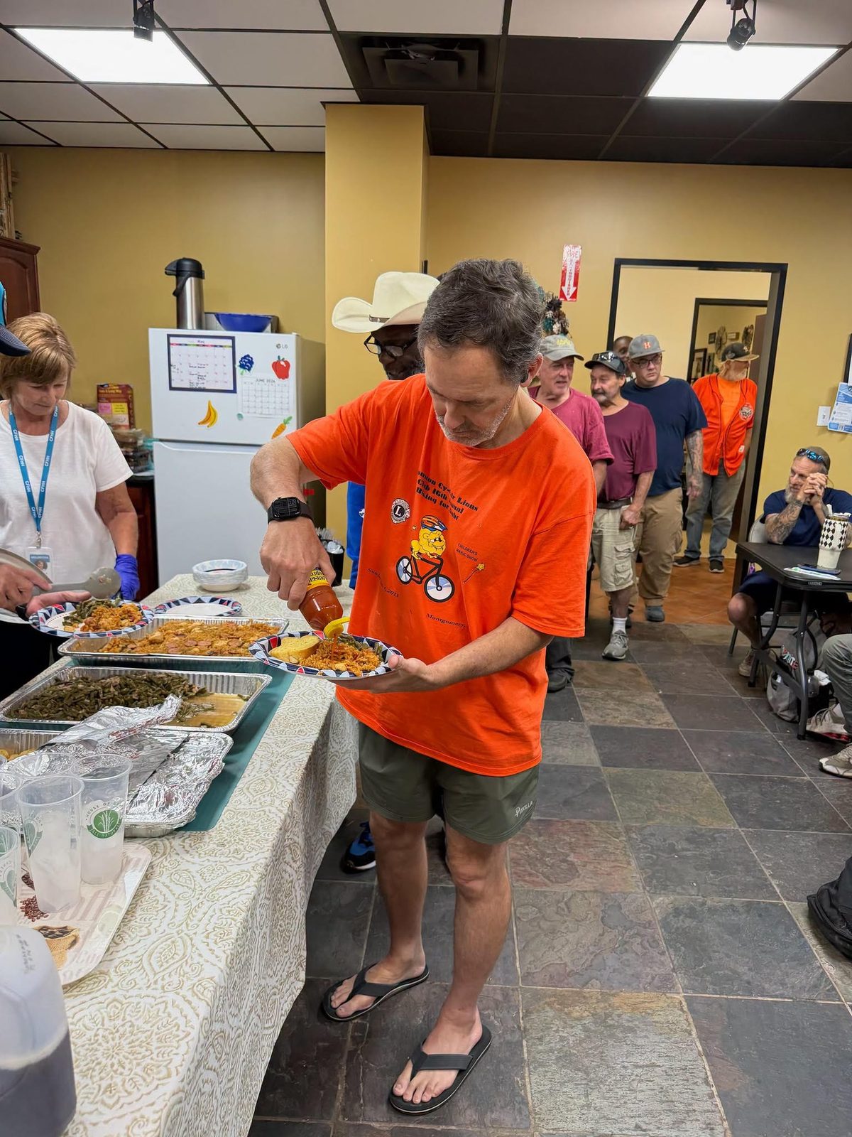 Volunteers serve hot meals at the Cy-Fair Helping Hands Day Center