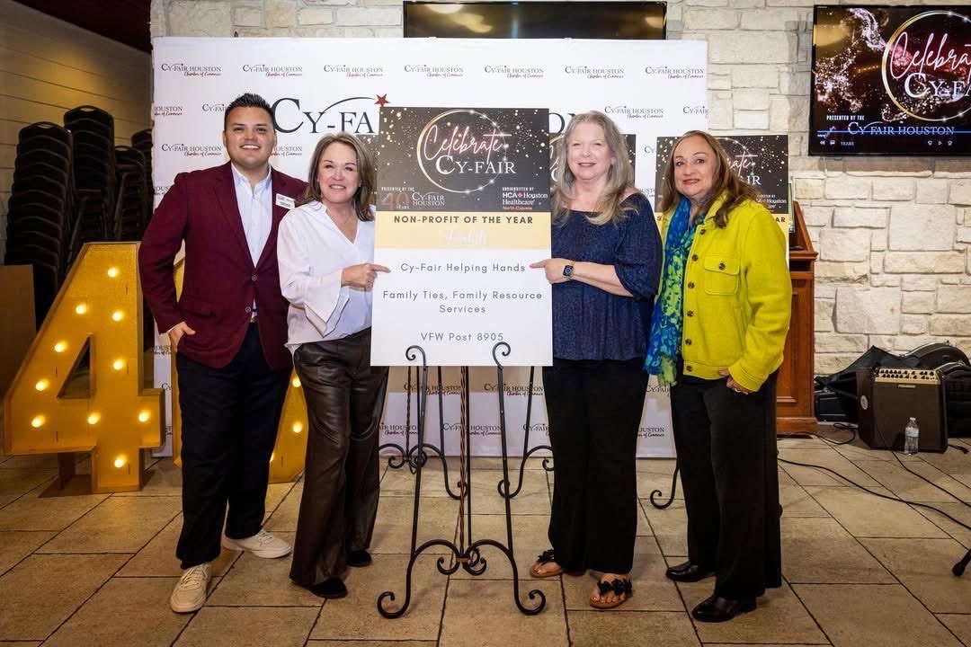 Cy-Fair Helping Hands accepting the Cy-Fair Houston Chamber of Commerce Non-Profit of the Year award